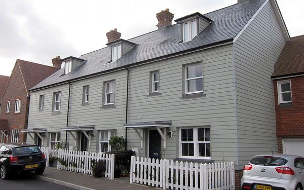 Green cladding installed to houses